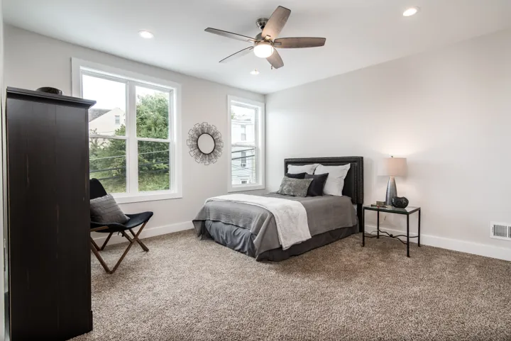 Bedroom with upholstered headboard